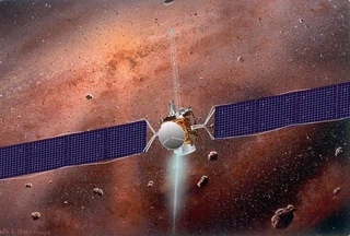 Vue d'artiste de Dawn dans les astéroïdes. Notez le joli jet d'ions bleuté